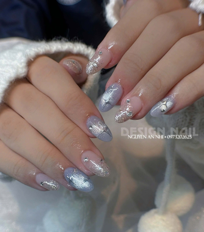 Nail tone xanh mắt mèo đính đá